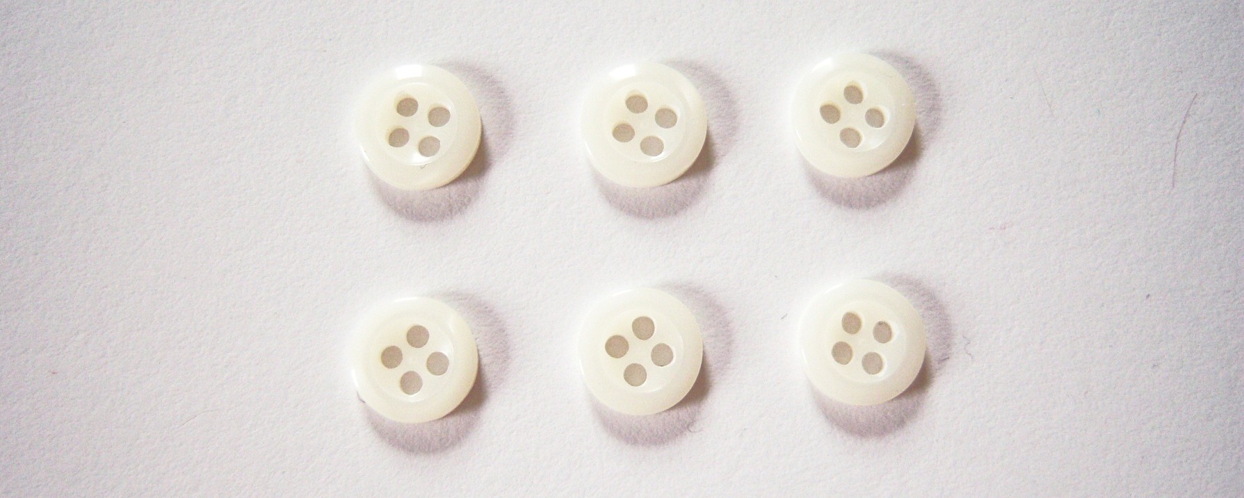 Ivory 11/32" Poly 4 Hole Button