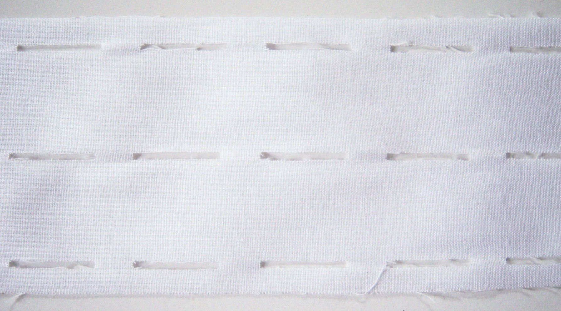 White Woven Perforated Fusible Interfacing