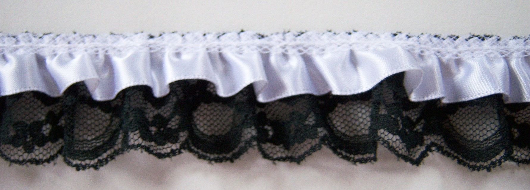 White Satin/Black 1 1/4" Ruffled Lace