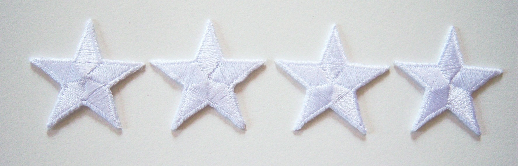 Four White Star Appliques