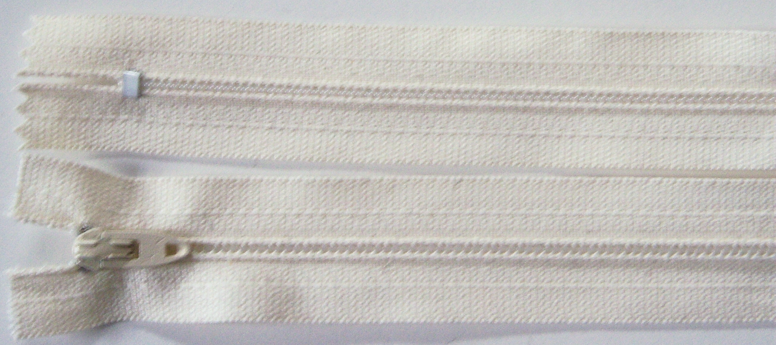 Ivory Talon 5.5" Zipper