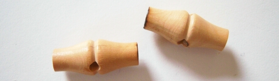 Natural wood toggle button.
