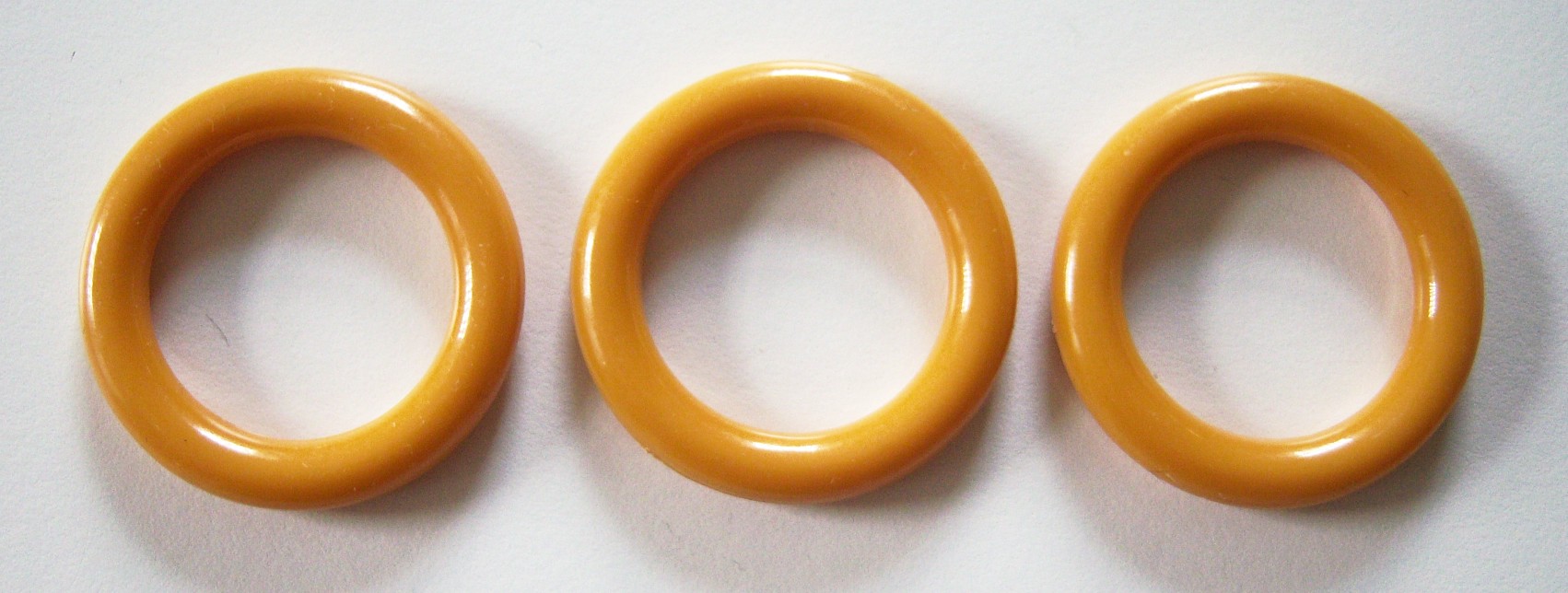 Ant. Gold Plastic 1" Rings 3 Pieces