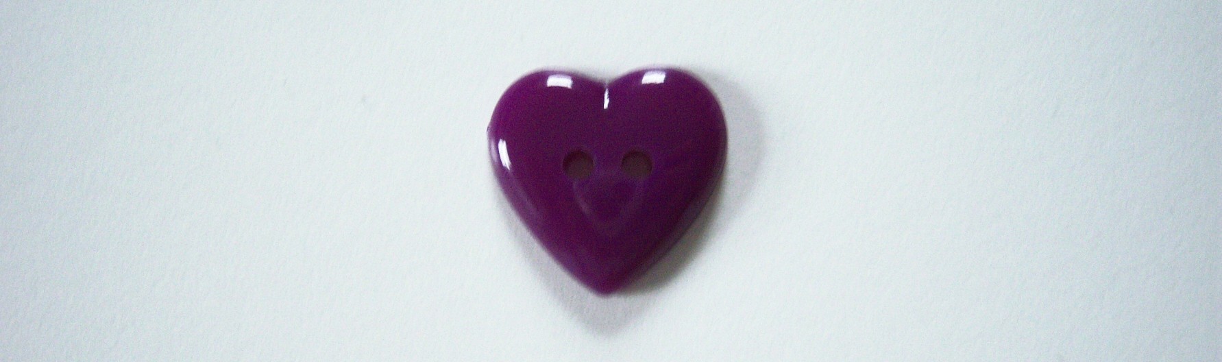 Purple heart 7/8" 2 hole shiny poly button.