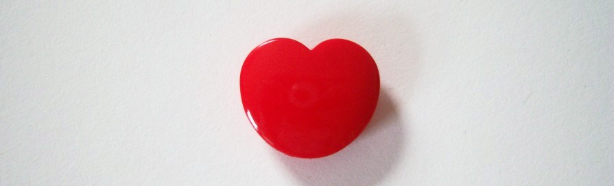 Solid red rounded heart 7/8" x 1" shank back poly button.