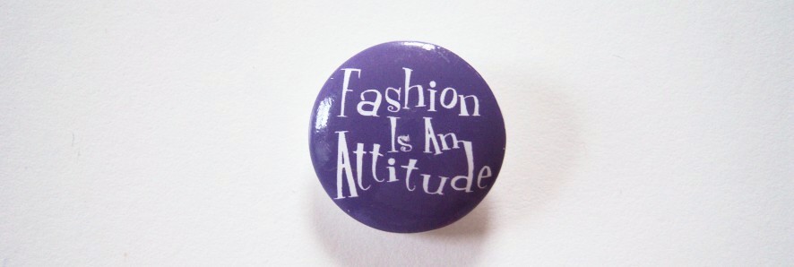 Round purple and in white script Fashion Is An Attitude 15/16" with shank back poly button.