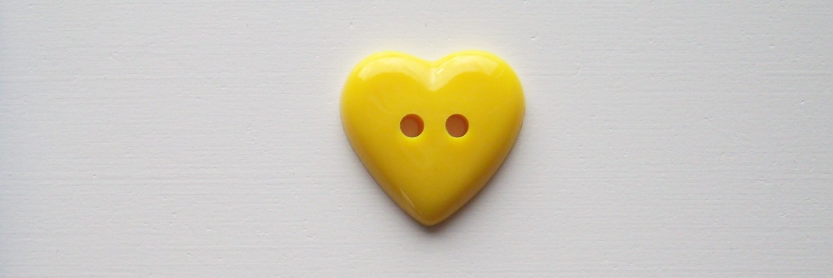 Yellow heart 7/8" 2 hole shiny poly button.