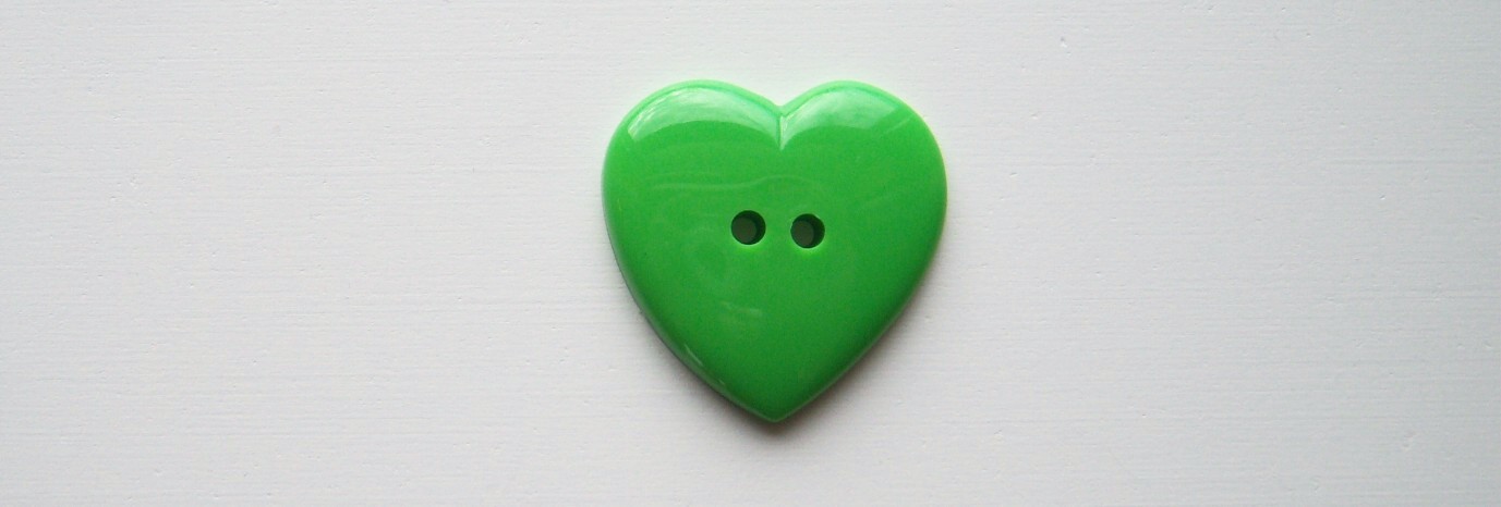 Spring green heart 1 3/16" 2 hole poly button.