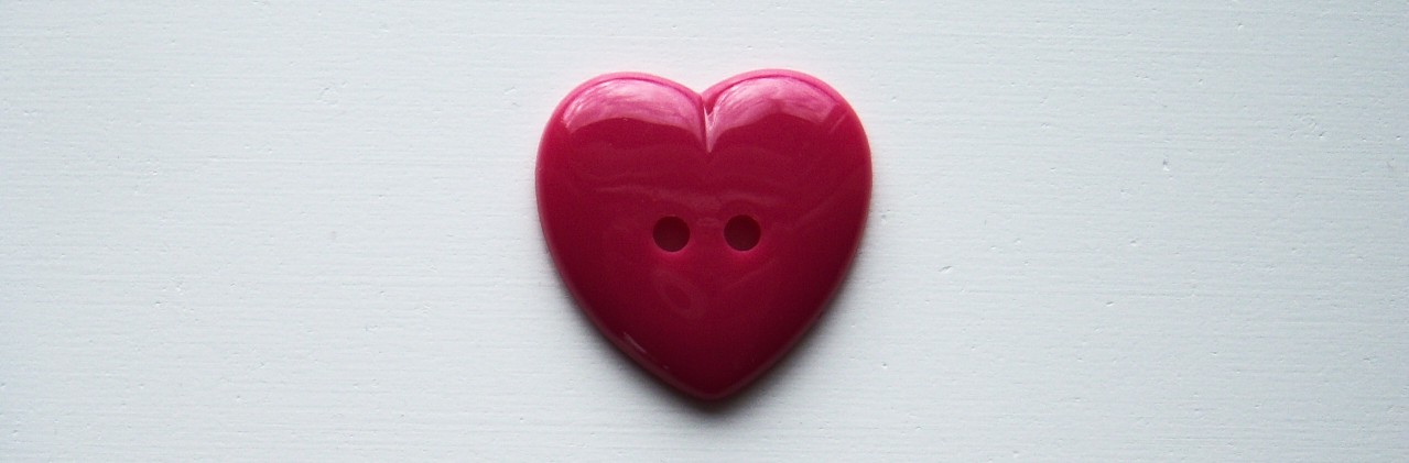 Rasberry heart 1 3/16" 2 hole poly button.