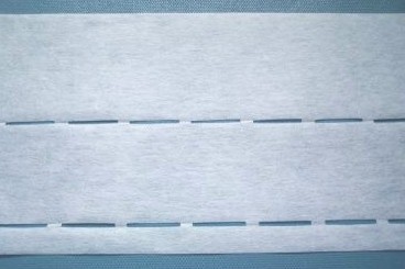 White Pellon Perforated Fusible Interfacing