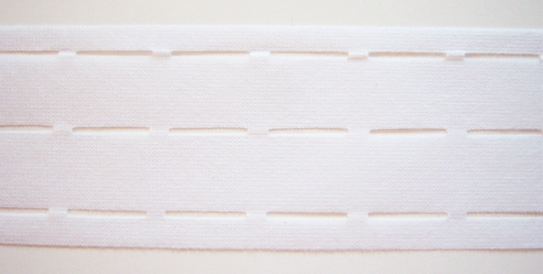 White Pellon Perforated Fusible Interfacing
